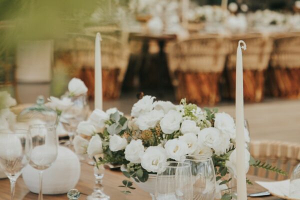Beautifully decorated wedding table with white flowers and candles